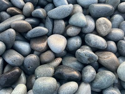 Zen garden with smooth stones and sand